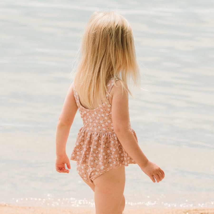 Ditsy Daisies Print on Wild Rose Skirted Swimsuit by Petit Lem
