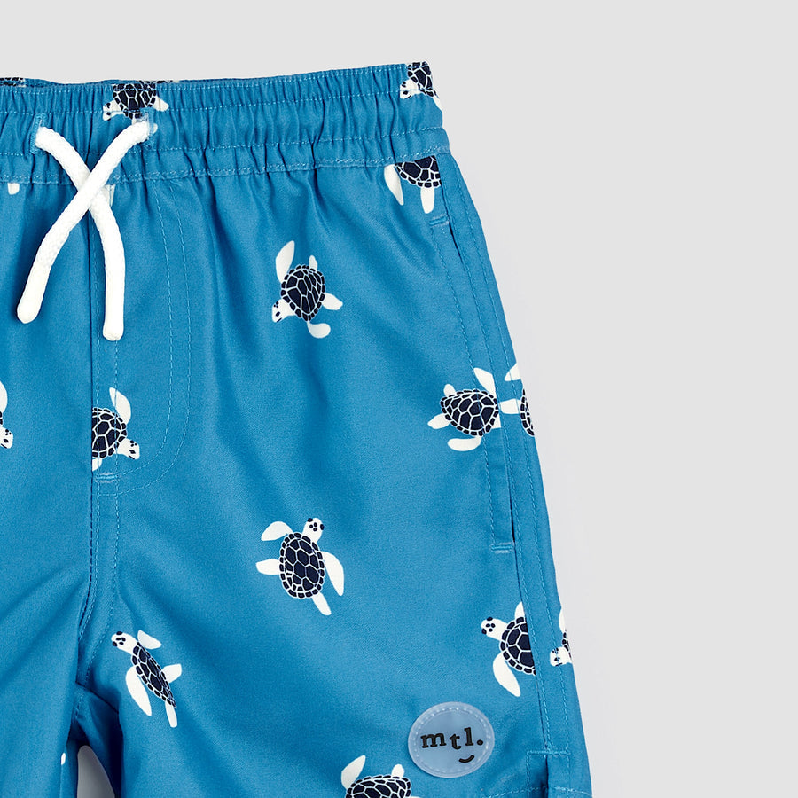 Sea Turtles Print on Bluejay Swim Trunks by miles the label.