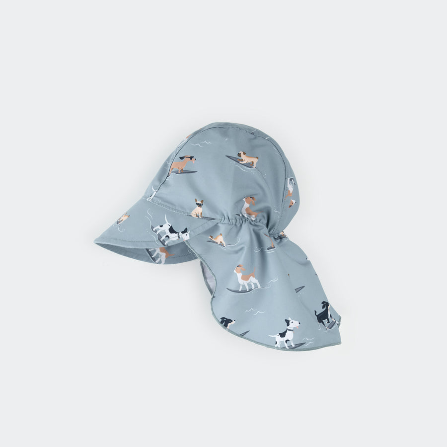 Surfing Pups on Blue Flap Hat by Petit Lem
