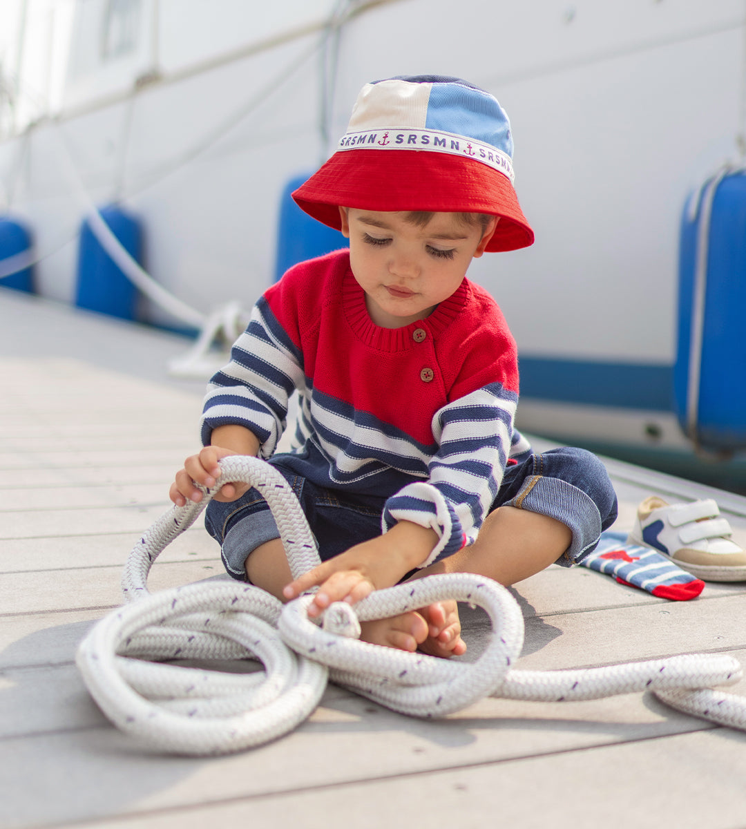 Red and blue striped knitted sweater by Sourismini