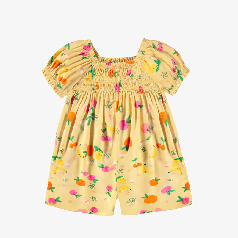 Yellow one-piece in viscose with fruit all over print by Souris Mini