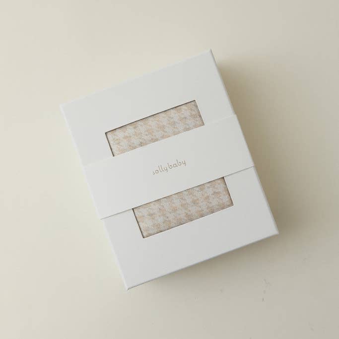 Cream Houndstooth Wrap by Solly Baby