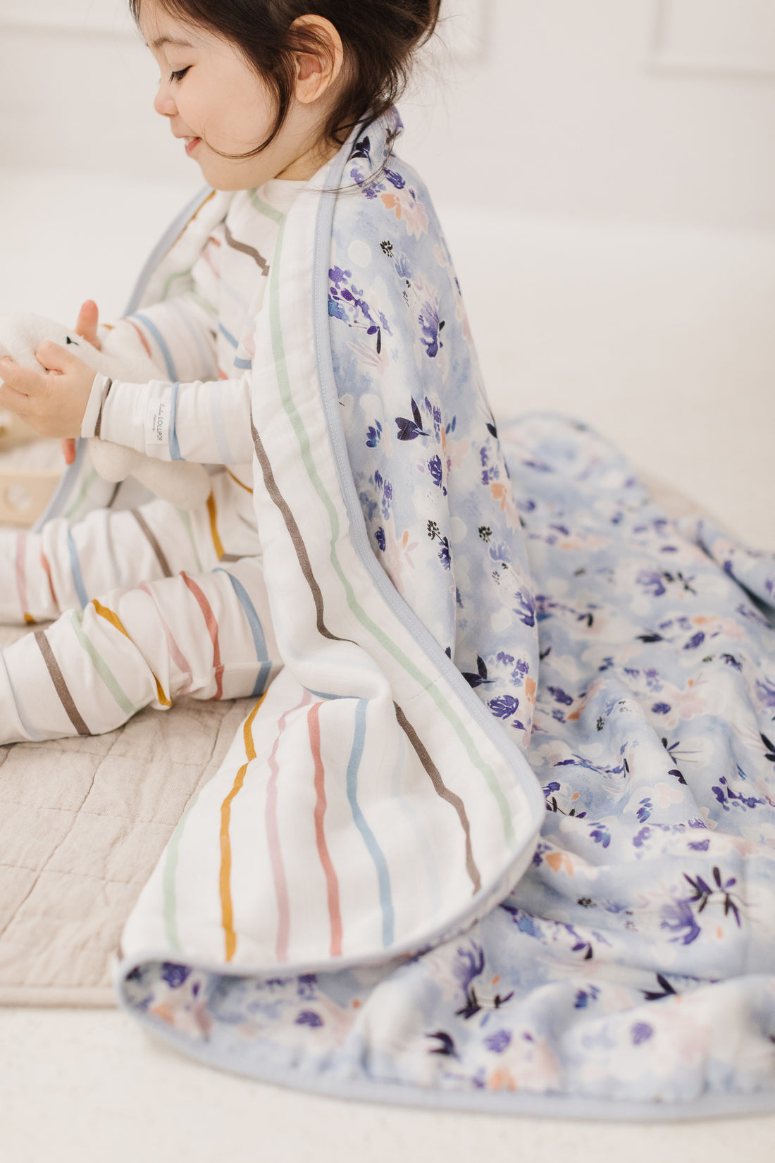 Muslin Quilt Blanket in Ink Floral by Loulou Lollipop