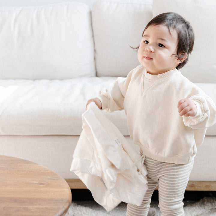 Satin Border Mini Blanket in Ivory by Saranoni