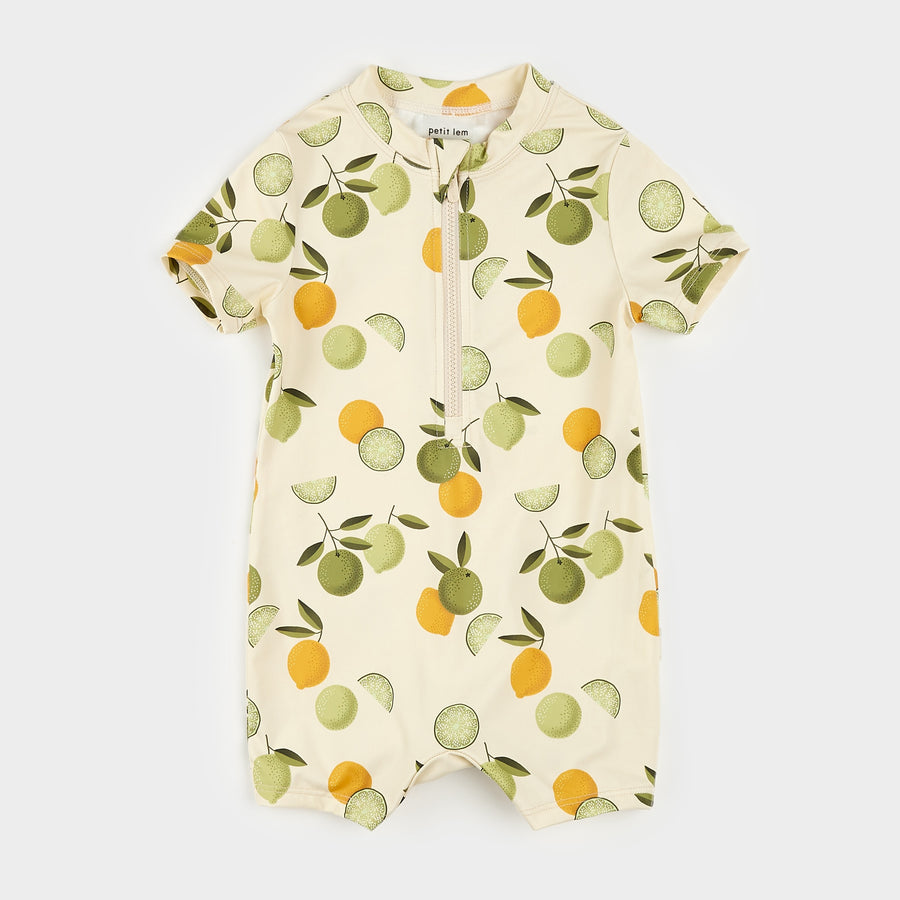 Citrus Print on Antique White Swim Romper by Petit Lem