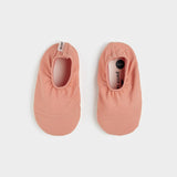 Fiery Coral Ribbed Swim Slippers by Petit Lem