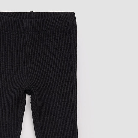 Black Flared Rib Leggings by Miles the Label
