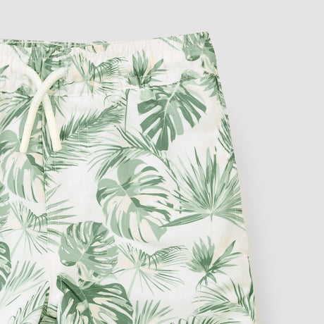 Jungle Leaves Print on Off-White Swim Trunks by miles the label