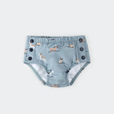 Surfing Pups on Blue Swim Diaper by Petit Lem