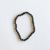 Raw Black Amber Necklace by CanyonLeaf