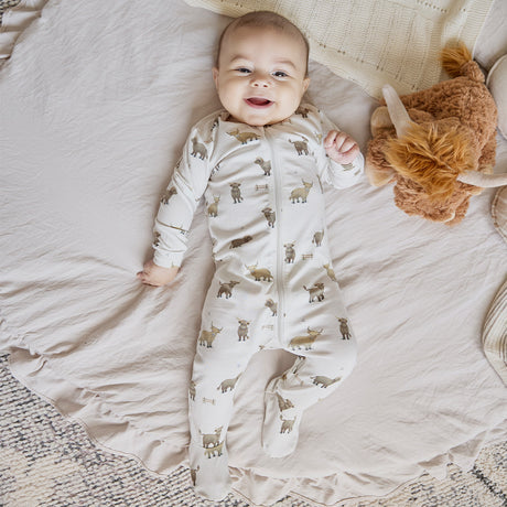 Highland Cow Print on Crème LunaKnit Sleeper by Petit Lem