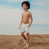 Jungle Leaves Print on Off-White Swim Trunks by miles the label