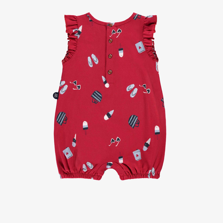 Red one-piece with all-over print by Sourismini