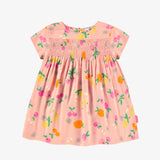 Pink dress in viscose with fruit all over print by Souris Mini