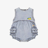 Pale blue romper in denim with ruffles by Souris Mini