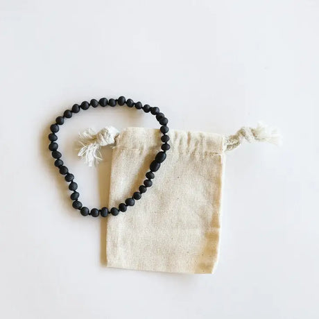 Raw Black Amber Necklace by CanyonLeaf