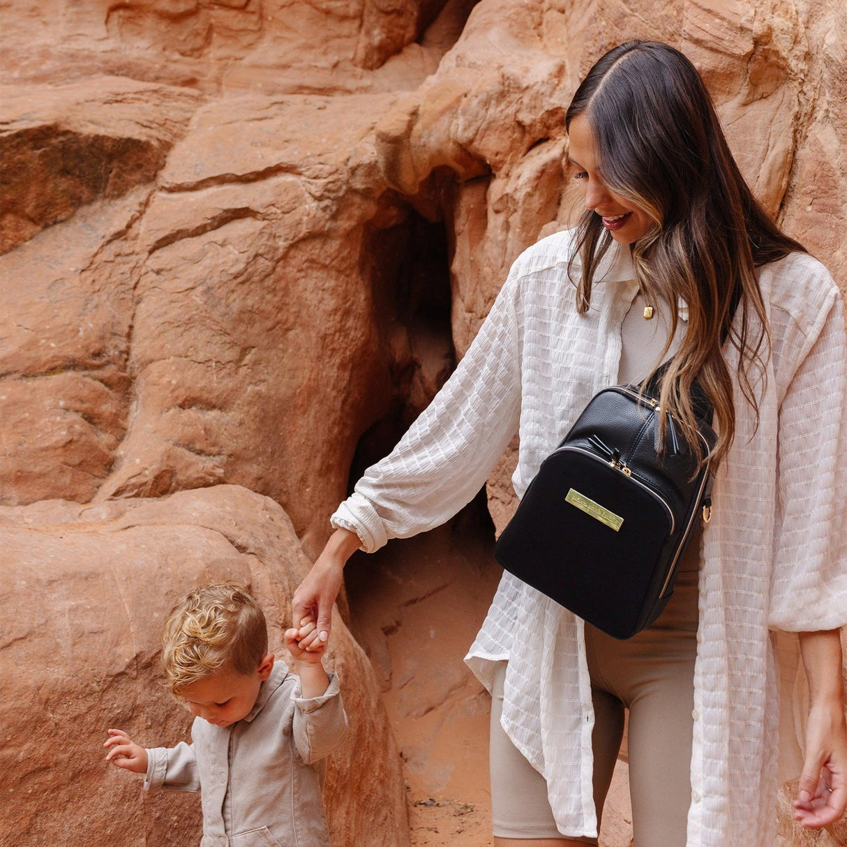 Criss-Cross Sling in Twilight Black by Petunia Pickle Bottom