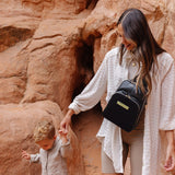 Criss-Cross Sling in Twilight Black by Petunia Pickle Bottom