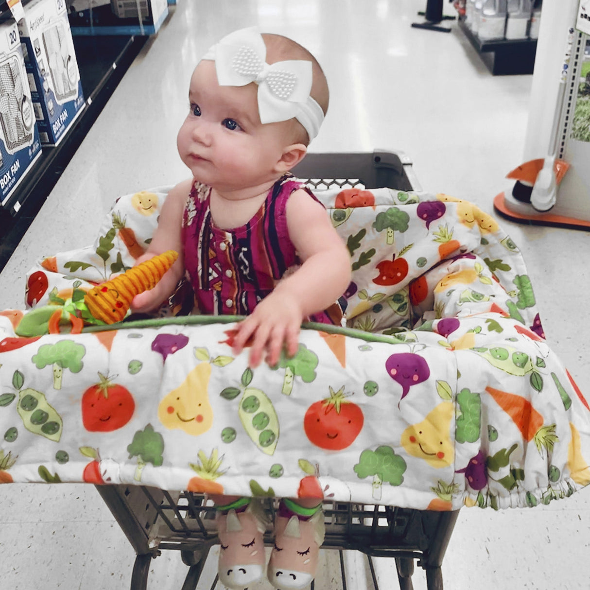 shopping cart and high chair cover in farmer's market by boppy