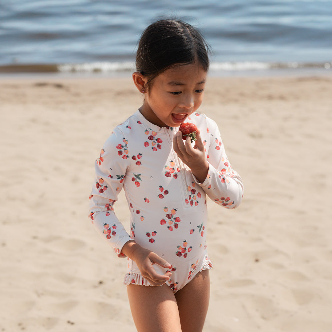 Strawberries on Light Pink L/S Swimsuit by Petit Lem
