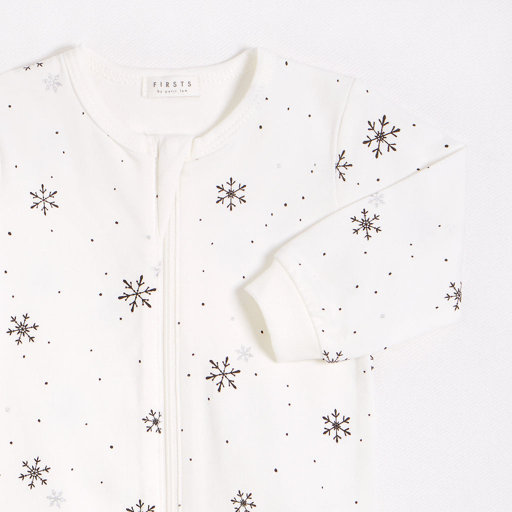 Snowflake Print on Off-White Sleeper by Petit Lem