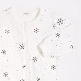 Snowflake Print on Off-White Sleeper by Petit Lem